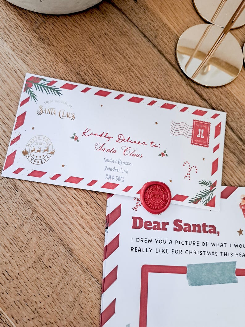 May include: A festive letter addressed to Santa Claus, featuring a red wax seal and a decorative border. The envelope includes a North Pole Express stamp and the text "Kindly Deliver to: Santa Claus". A matching letter is visible below.