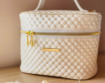 Vanity Chic in pearly faux leather with padded effect toiletry bag