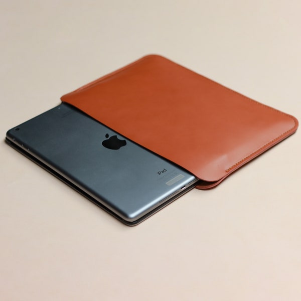 Personalized Ipad Sleeve Made from Italian Vegetable Tanned Leather, Full Grain Leather, Apple logo and foil options are available.