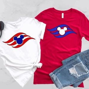 May include: Two t-shirts featuring a red, white and blue Mickey Mouse wave logo. One shirt is white and the other is red.