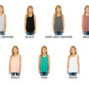 May include: A set of 10 girls' tank tops in various colors, including athletic heather, black, dark grey heather, mauve, peach, teal, and white.