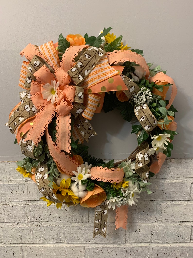 Orange Ranunculus and an XL handmade Bow Yellow Sunflowers White Daisies Peach Grapevine Wreath wFaux Cotton