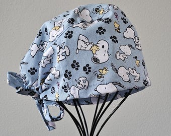 Blue Snoopy with Paw Print Surgical Scrub Cap and Badge Reel