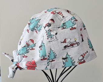 Sledding Christmas Snoopy Surgical Scrub Cap and Badge Reel