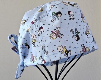 Ice Skating Christmas Snoopy Peanuts Surgical Scrub Cap and Badge Reel