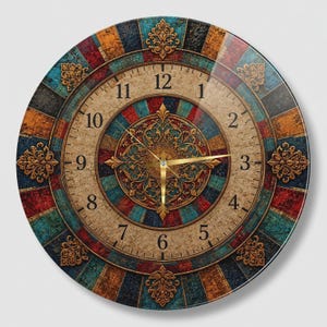 May include: A round wall clock featuring a beige face with black Arabic numerals. The outer border displays a segmented pattern of teal, red, and orange panels with gold-colored floral accents. The center has an intricate gold filigree design.
