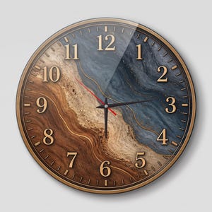 May include: A round wall clock featuring a split design with a dark blue marble pattern on the right and a brown wood grain texture on the left. The clock face displays gold-colored Arabic numerals, black hour and minute hands, and a red second hand.