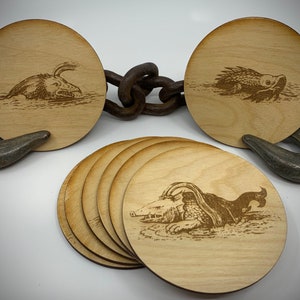 sea monster heat & water resistant low profile, light weight, engraved wooden coasters with cork backing