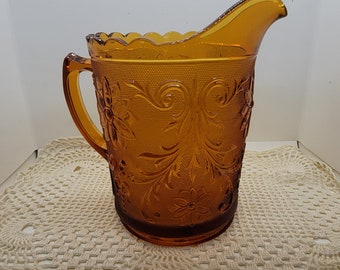 Indiana Glass Tiara Sandwich Amber Collection 68-Ounce Pitcher, Pressed Sandwich Design with Flowers & Leaves, 1970's, Footed base (2680)