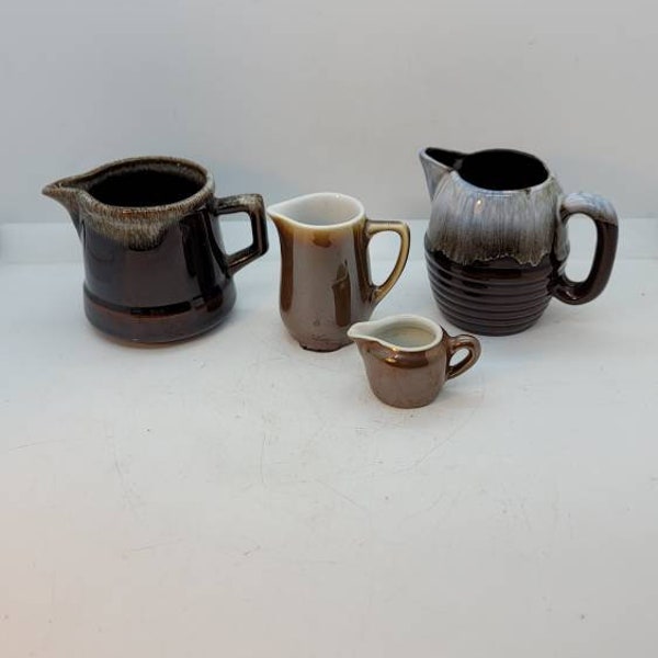 Four Small Brown Ceramic Creamer Pitchers, One is Fraunfelter, One is Bauscher Weiden, Range from One Fluid Ounce to One Cup Capacity (2279)