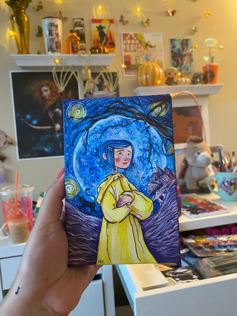 May include: A hand-painted canvas featuring a girl with blue hair wearing a yellow raincoat standing in front of a large blue moon with a starry night sky background. The painting is signed "MCC" in the bottom right corner.