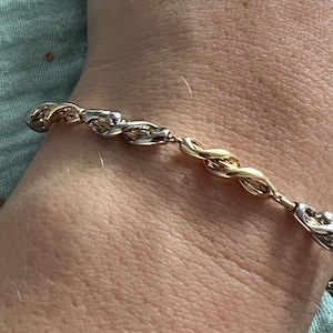 Magnificent two-tone bracelet with Charles Jourdan characters