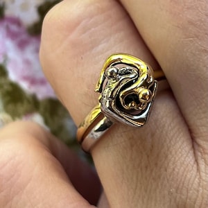 Charles Jourdan two-tone double ring with onyx stone, size 56