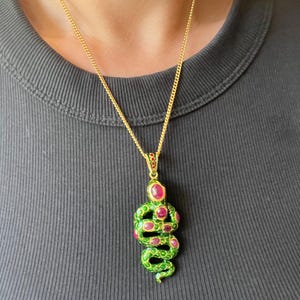 Magnificent enameled snake pendant with ruby cabochons