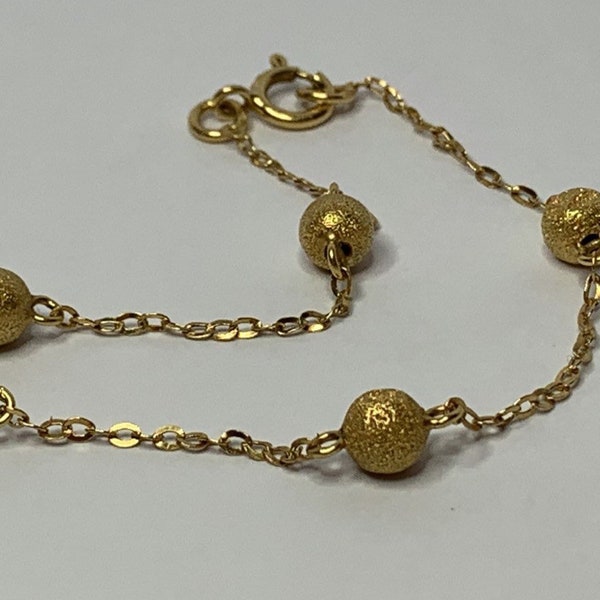 Magnifique bracelet vintage en or jaune 5 boules