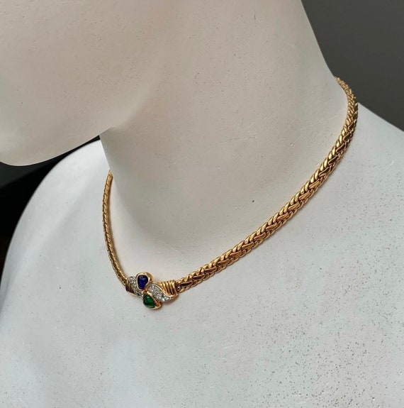 Très joli collier doré deux cœurs et zircons