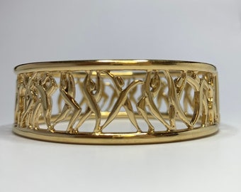 Magnifique bracelet manchette personnages Charles Jourdan