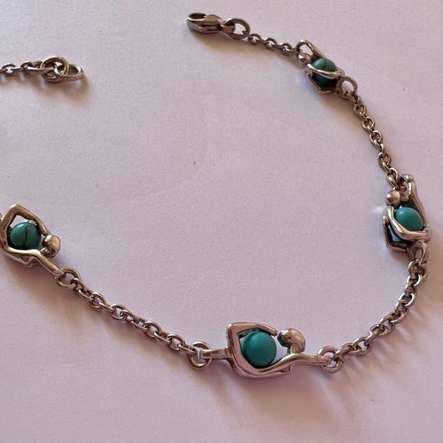 Delicate bracelet muses and tanzanites in silver 925 Charles shops Jourdan