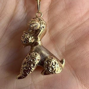 Very pretty little poodle pendant in 14K yellow gold