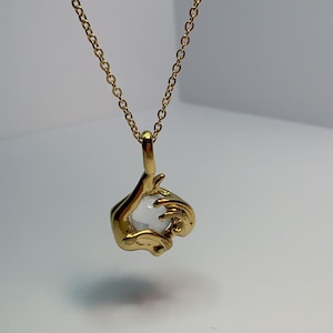 Sculptural Charles Jourdan muse pendant and crystal ball