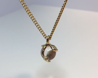 Charles Jourdan crystal ball pendant