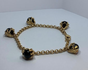 Pretty Charles Jourdan onyx charm bracelet