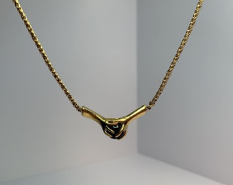 Iconic Charles Jourdan hands and onyx necklace