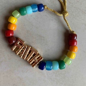 Bonita pulsera de cuentas de colores FE