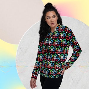 May include: A black bomber jacket with a colorful stained glass pattern featuring a globe design. The jacket has a zipper closure and long sleeves.