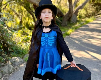 Embrace the Spooky Style with 'I'm A Ghost In a Hatbox' Girls Sleeveless Skater Dress