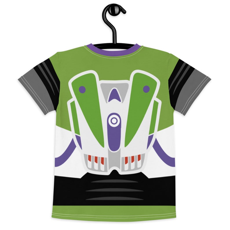 May include: A green, white, purple, and black t-shirt with a cartoon image of Buzz Lightyear from the Toy Story movie franchise.