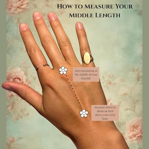 May include: Image showing a hand with text that reads "HOW TO MEASURE YOUR MIDDLE LENGTH". The text provides instructions on measuring, starting at the middle of the knuckle and measuring down about an inch above the wrist bone.