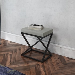 KABI modern stool / seat in the hall.  Unique look. Strong metal frame. Hand made in Poland..