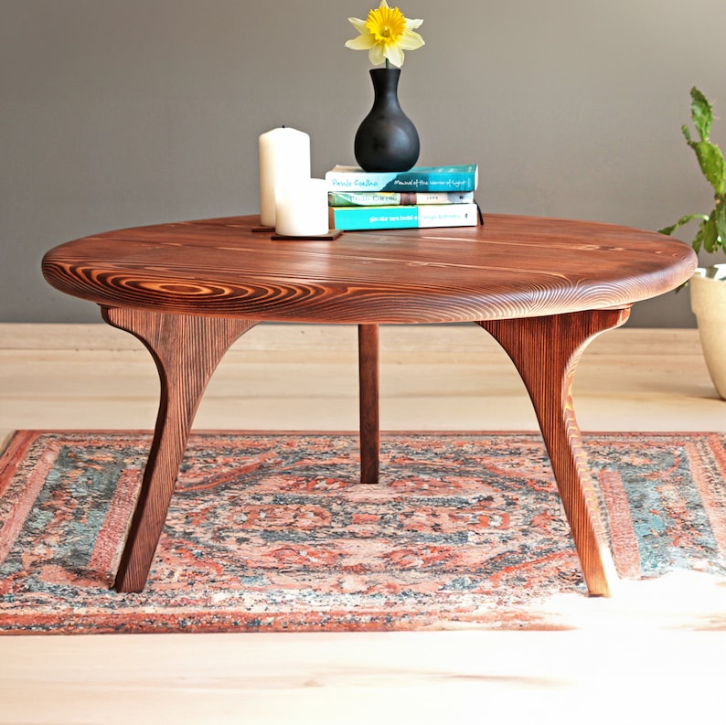 round coffee table with rustic design