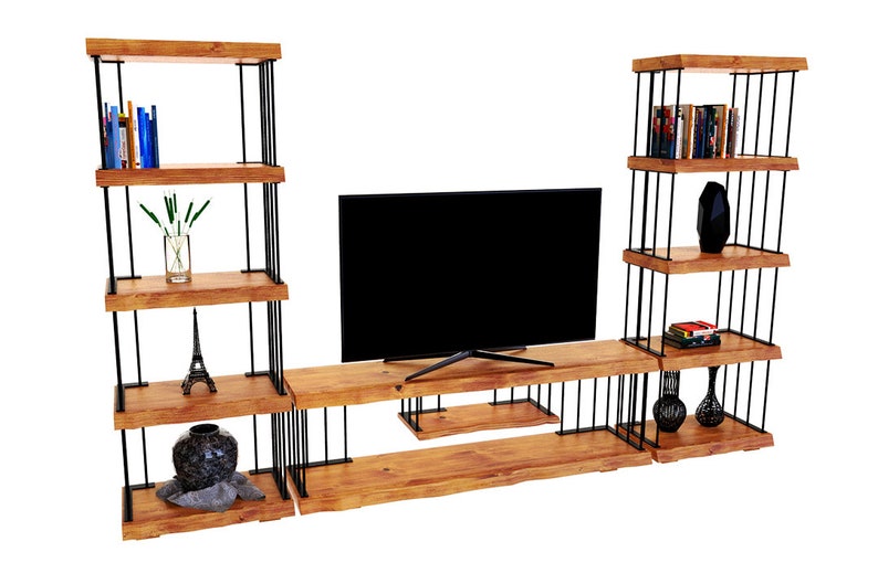 May include: A wooden TV stand with black metal accents and shelves. The stand has three shelves on each side and a lower shelf for a TV. The shelves are filled with books, vases, and decorative items.