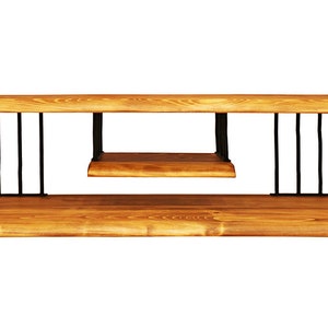 May include: A wooden TV stand with a lower shelf and black metal supports. The stand has a natural wood finish and a simple design.