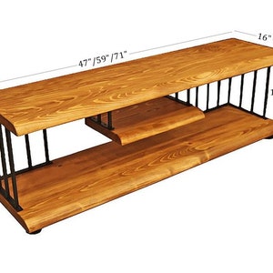 May include: A wooden TV stand with a black metal frame. The stand has two shelves and measures 47 inches, 59 inches, or 71 inches long, 16 inches wide, and 19.5 inches high.