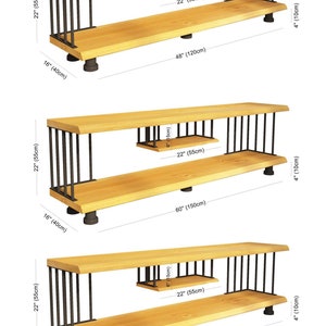May include: Three wooden shelves with black metal frames. The shelves are 22 inches wide and 4 inches tall. The shelves are 48, 60, and 72 inches long.