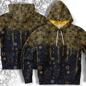 May include: A black hoodie with a gold and black celestial pattern. The hoodie has a drawstring hood and a kangaroo pocket. The pattern features stars, moons, and suns.