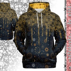 May include: A black hoodie with a gold and black celestial print. The hoodie has a drawstring hood and a kangaroo pocket. The print features stars, moons, and suns.