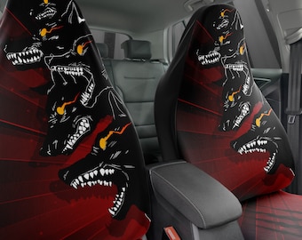 May include: Two black car seat covers with a red background and a graphic of multiple black wolf heads with glowing yellow eyes. The wolf heads are arranged in a circular pattern.