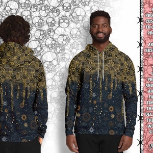 May include: A black hoodie with a gold and white celestial pattern. The hoodie has a drawstring hood and a kangaroo pocket. The pattern features stars, moons, and suns.