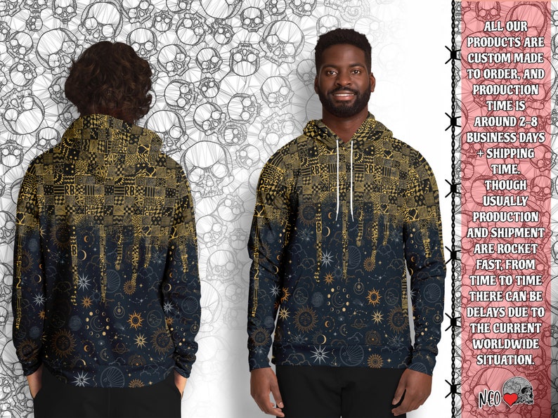 May include: A black hoodie with a gold and white celestial pattern. The hoodie has a drawstring hood and a kangaroo pocket. The pattern features stars, moons, and suns.