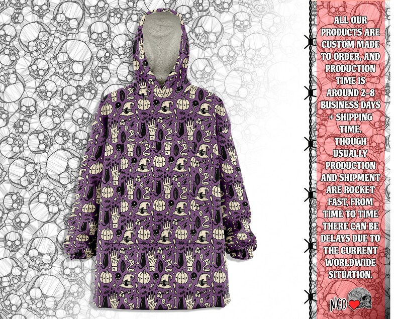 May include: Purple hooded sweatshirt with a black and white print of various Halloween themed symbols, including skulls, pumpkins, and witches' hats.