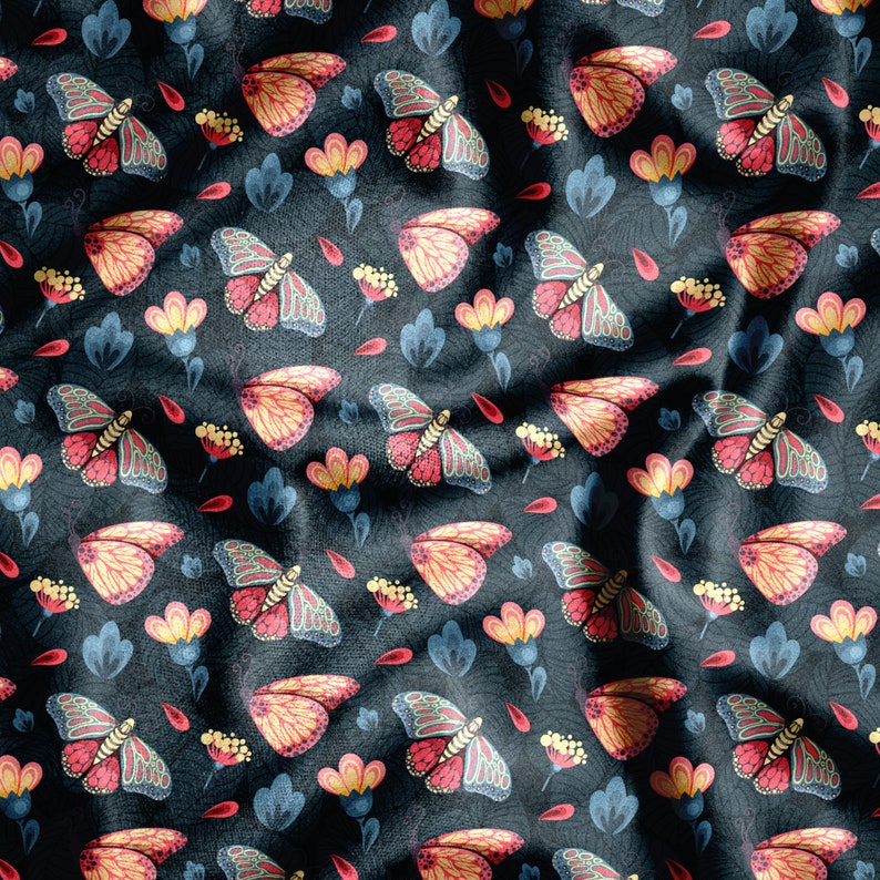May include: A dark blue fabric with a repeating pattern of colorful butterflies and flowers. The butterflies have red, yellow, and blue wings, and the flowers are yellow, pink, and blue.