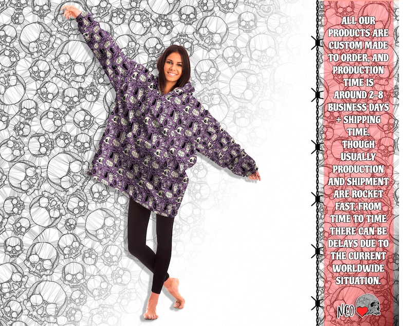 May include: A purple hooded blanket with a skull pattern. The blanket is worn by a person standing in front of a white background with a skull pattern. The text on the right side of the image reads: "ALL OUR PRODUCTS ARE CUSTOM MADE TO ORDER, AND PRODUCTION TIME IS AROUND 2-8 BUSINESS DAYS + SHIPPING TIME. THOUGH USUALLY PRODUCTION AND SHIPMENT ARE ROCKET FAST, FROM TIME TO TIME THERE CAN BE DELAYS DUE TO THE CURRENT WORLDWIDE SITUATION. NEO"