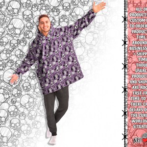 May include: A purple hooded sweatshirt with a skull pattern. The text on the right side of the image reads "ALL OUR PRODUCTS ARE CUSTOM MADE TO ORDER, AND PRODUCTION TIME IS AROUND 2-8 BUSINESS DAYS + SHIPPING TIME. THOUGH USUALLY PRODUCTION AND SHIPMENT ARE ROCKET FAST, FROM TIME TO TIME THERE CAN BE DELAYS DUE TO THE CURRENT WORLDWIDE SITUATION. NEO"