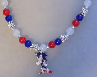 Collier ras de cou en perles de verre fait main bleu rouge blanc charme Sonic le hérisson fait par des fans