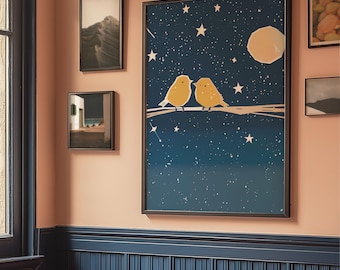 May include: A framed art print featuring two yellow birds perched on a branch against a dark blue night sky filled with stars and a full moon. The artwork is displayed on a pink wall, alongside other framed pictures.
