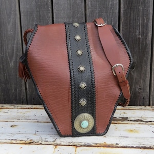 Four Winds West Leather Handbag Purse with Braided Leather Shoulder Strap. Sterling Silver Conch Decor. All leather. Turquoise cabochon